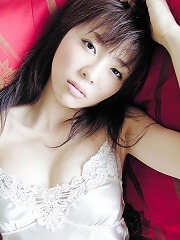 Enchanting and gorgeous gravure idol laying around in lingerie